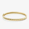 Pulsera r&iacute;gida de oro amarillo de 18K con diamantes blancos en talla brillante de 0,58 cts