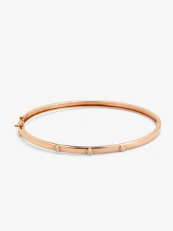 Pulsera r&iacute;gida de oro rosa de 18K con diamantes en talla brillante de 0,07 cts