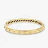 Pulsera r&iacute;gida de oro amarillo de 18K con 11 diamantes en talla brillante con un total de 0,36 cts