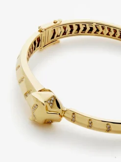 Pulsera r&iacute;gida de oro amarillo de 18K con 61 diamantes en talla brillante con un total de 0,23 cts y forma de tigre