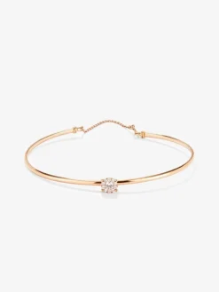 Pulsera r&iacute;gida de oro rosa de 18K con 11 diamantes en talla brillante con un total de 0,21 cts