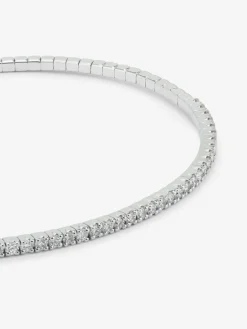 Pulsera r&iacute;gida de oro blanco de 18K con 42 diamantes en talla brillante con un total de 0,71 cts