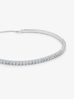 Pulsera r&iacute;gida de oro blanco de 18K con diamantes blancos en talla brillante de 1,04 cts