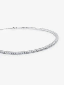 Pulsera r&iacute;gida de oro blanco de 18K con diamantes blancos en talla brillante de 0,39 cts