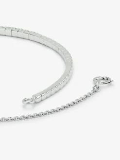 Pulsera r&iacute;gida de oro blanco de 18K con 42 diamantes en talla brillante con un total de 0,71 cts