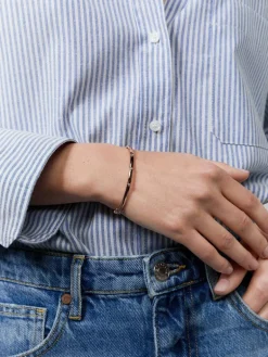 Pulsera r&iacute;gida de oro rosa de 18K con diamantes en talla brillante de 0,07 cts