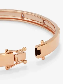 Pulsera r&iacute;gida de oro rosa de 18K con diamantes blancos en talla brillante de 0,13 cts