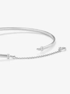 Pulsera r&iacute;gida de oro blanco de 18K con 11 diamantes en talla brillante con un total de 0,2 cts