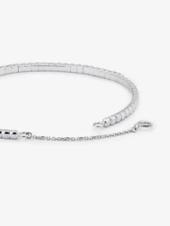 Pulsera r&iacute;gida de oro blanco de 18K con diamantes blancos en talla brillante de 1,04 cts