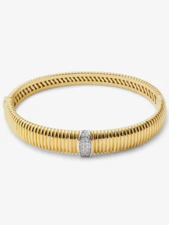 Pulsera r&iacute;gida gallonada de oro blanco y amarillo de 18K con pavé de diamantes en talla brillante con un total de 0,16 cts