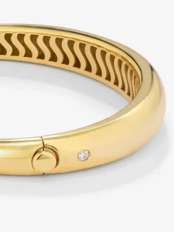 Pulsera rígida lisa de oro amarillo de 18K con diamante