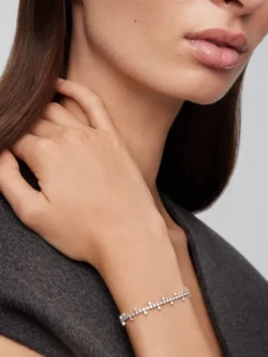 Pulsera semi rigida de oro blanco de 18K y diamante