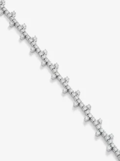 Pulsera semi rigida de oro blanco de 18K y diamante