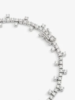 Pulsera semi rigida de oro blanco de 18K y diamante